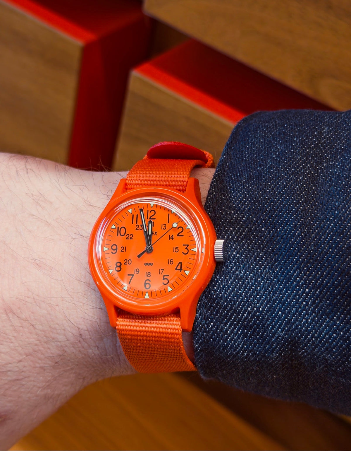 Timex MK1 orange on the wrist — photo: Uncommon Artifact