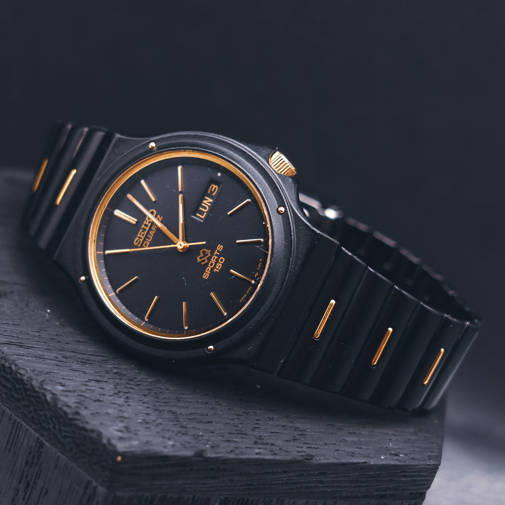 Vintage Seiko SQ Sports 150 Watch - Black Ceramic Coated & Gold - Thin Case - Screw Down Back - 1980s Quartz